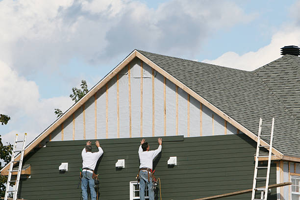 Professional Siding Replacement technician working in Cambridge, MA